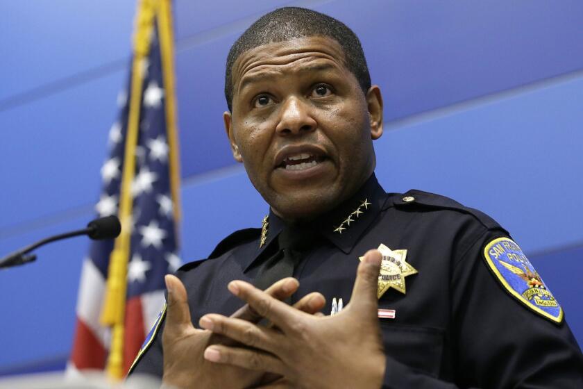 FILE - In this May 21, 2019, file photo, San Francisco Police Chief William Scott answers questions during a news conference in San Francisco. Scott is apologizing for raiding a freelance journalist's home and office to find out who leaked a police report into the unexpected death of the city's former public defender. Scott told the San Francisco Chronicle on Friday, May 24, 2019, the searches were probably illegal and said, "I'm sorry that this happened." (AP Photo/Eric Risberg, File)