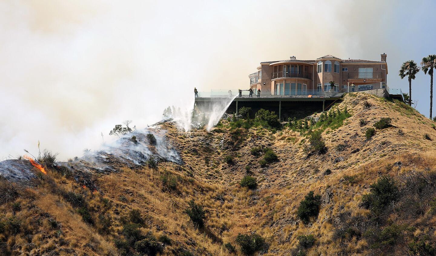 Crews battle Burbank brush fire