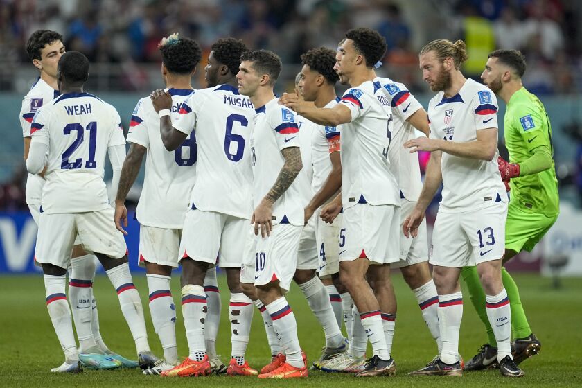 U.S players gather at the beginning of the second half during the World Cup round of 16 soccer match.