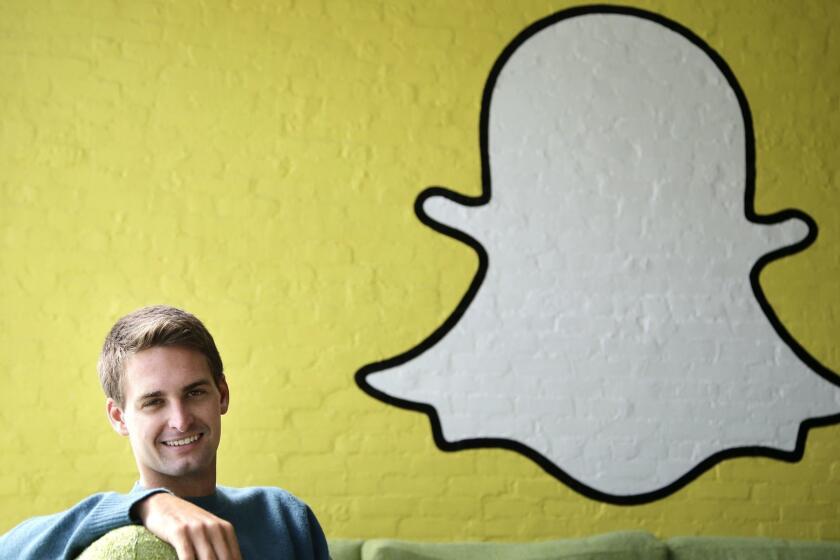 FILE - In this Thursday, Oct. 24, 2013, file photo, Snapchat CEO Evan Spiegel poses for a photo in Los Angeles. Tax-filing season is turning into a nightmare for thousands of employees working at companies tricked into relinquishing tax documents exposing peoples incomes, addresses and Social Security numbers to scam artists. In fact, in a Feb. 28, 2016, post on its corporate blog, Snapchat revealed that its payroll department had been duped by an email impersonating Spiegel. (AP Photo/Jae C. Hong, File)
