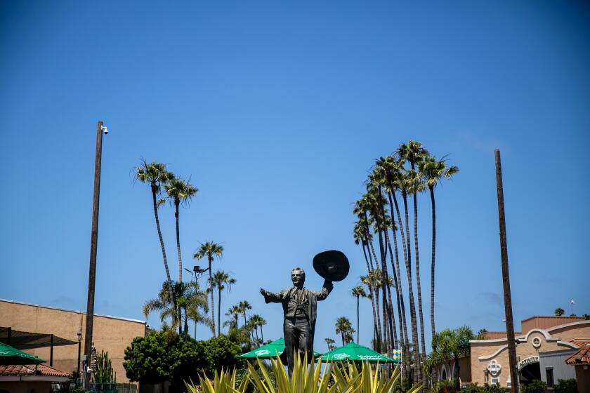 A statue of Don Diego, the former goodwill ambassador to the Del Mar Fair, greets fans arriving at the Del Mar Racetrack on the day that two horses died in a training accident on July 18, 2019 in Del Mar, California.
