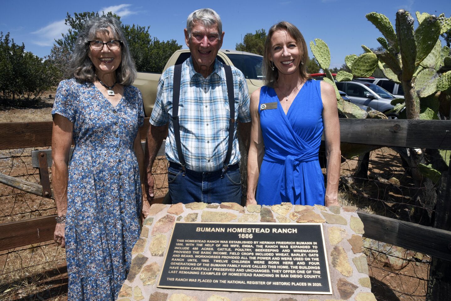 Twink and Richard Bumann are joined by Encinitas Mayor Catherine Blakespear at the National Register of Historic Places plaque