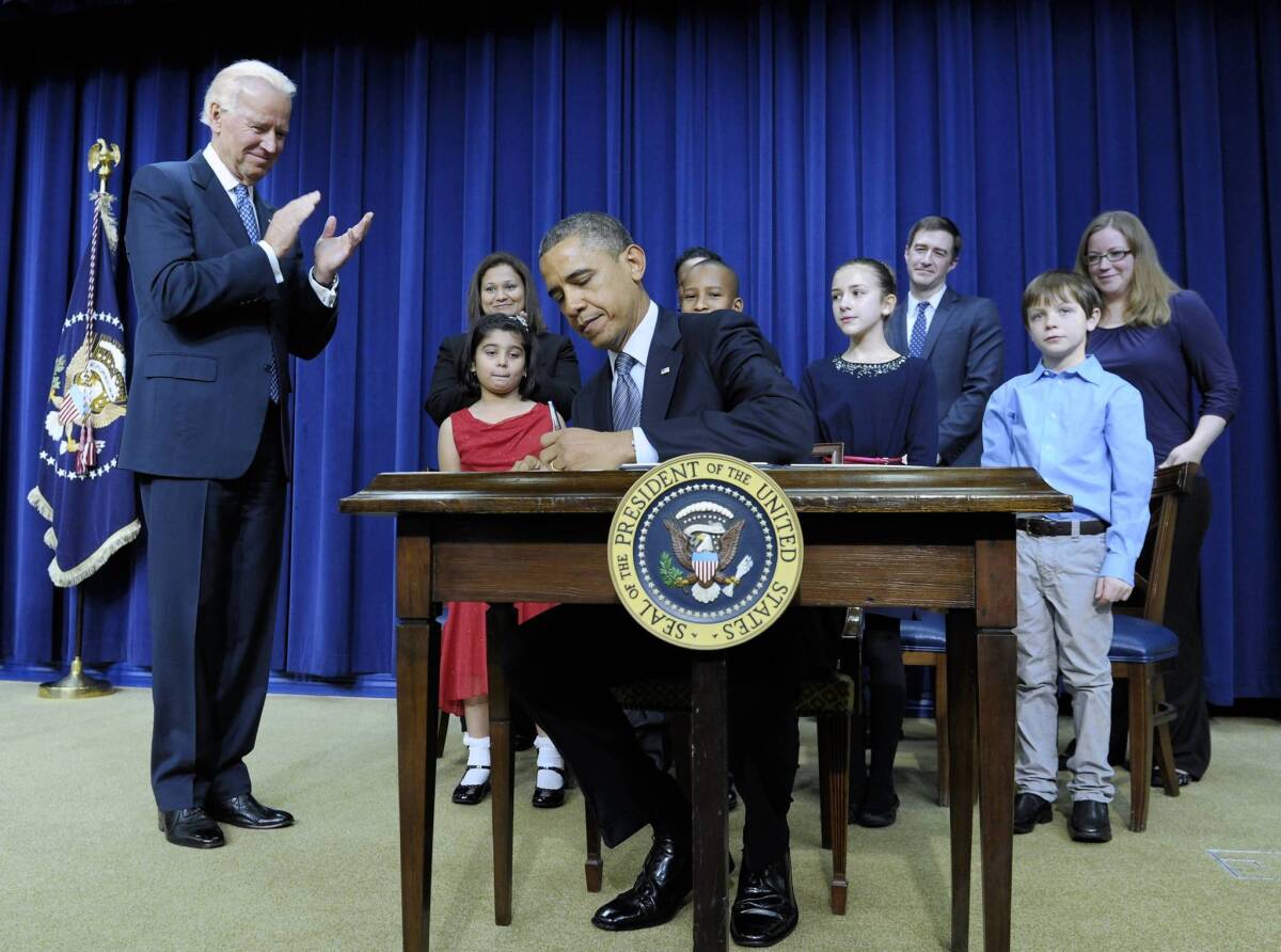 President Obama signs executive orders on gun control at the White House last week.