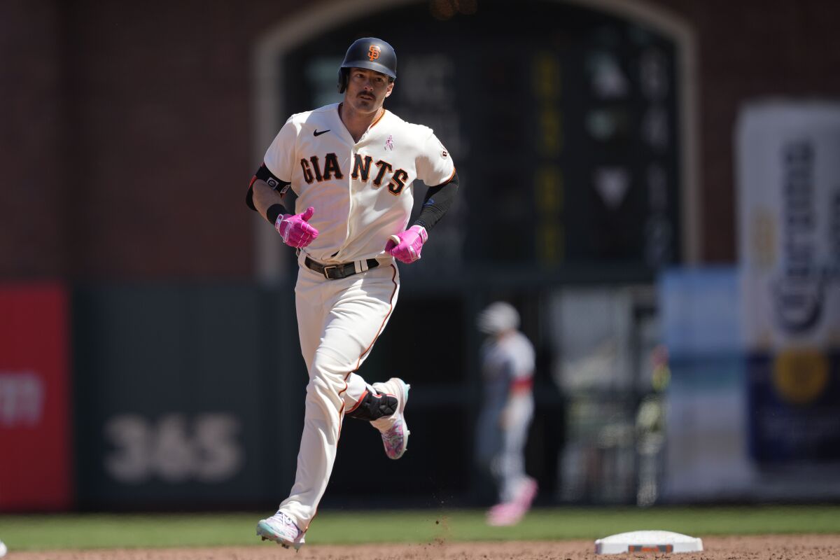 San Francisco Giants' Mike Yastrzemski rounds the bases after hitting a home run against St. Louis Cardinals during the sixth inning of a baseball game Sunday, May 8, 2022, in San Francisco. (AP Photo/Tony Avelar)