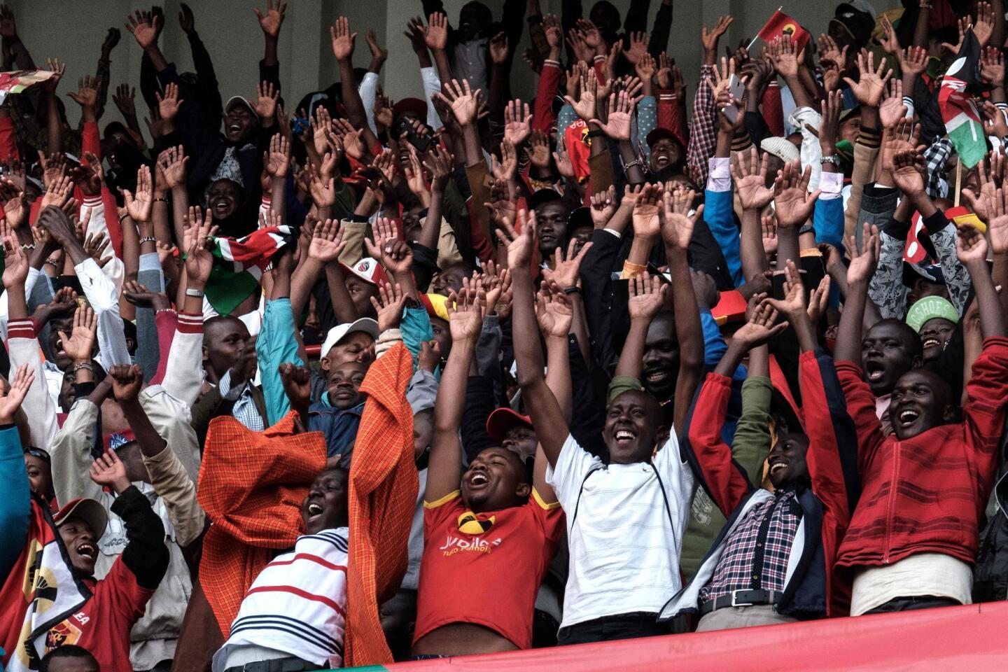 Kenyan president sworn as police fire tear gas to break up opposition gathering