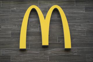 FILE - A McDonald's golden arches is shown at restaurant in Havertown, Pa., Tuesday, April 26, 2022. McDonald’s expects to open nearly 10,000 restaurants over the next four years, Wednesday, Dec. 6, 2023, a pace of growth that would be unprecedented even for the world's largest burger chain. (AP Photo/Matt Rourke)
