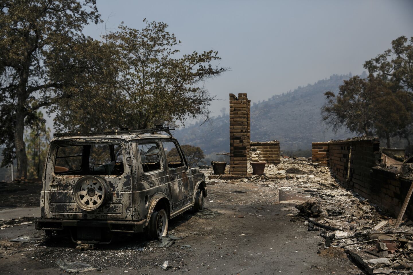 A home destroyed in the Detwiler Fire along Hunters Valley Road near Mariposa, Calif. The blaze has now burned more than 70,000 acres and is 10% contained.