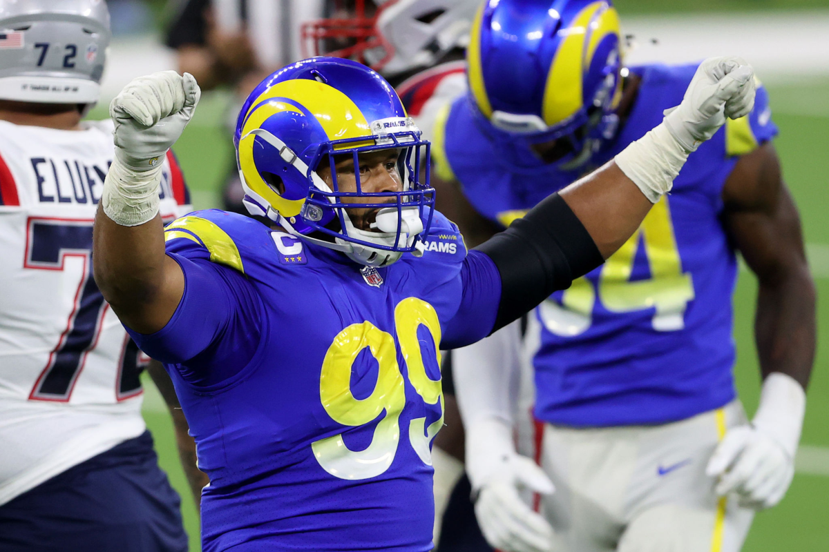 Rams defensive lineman Aaron Donald celebrates a turnover on downs against the New England Patriots on Dec. 10.