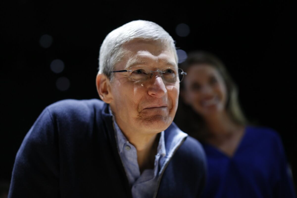 Apple CEO Tim Cook, seen in March in San Francisco, has declined to comment on rumors that his company is building a self-driving electric car.
