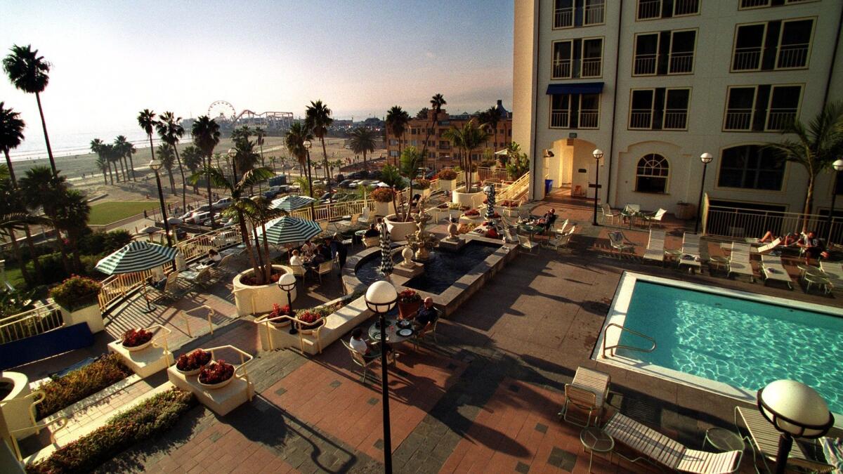 The Loews Santa Monica hotel overlooks the beach. Labor union leaders and city officials worry that the new Chinese owners may convert the hotel into luxury condos.