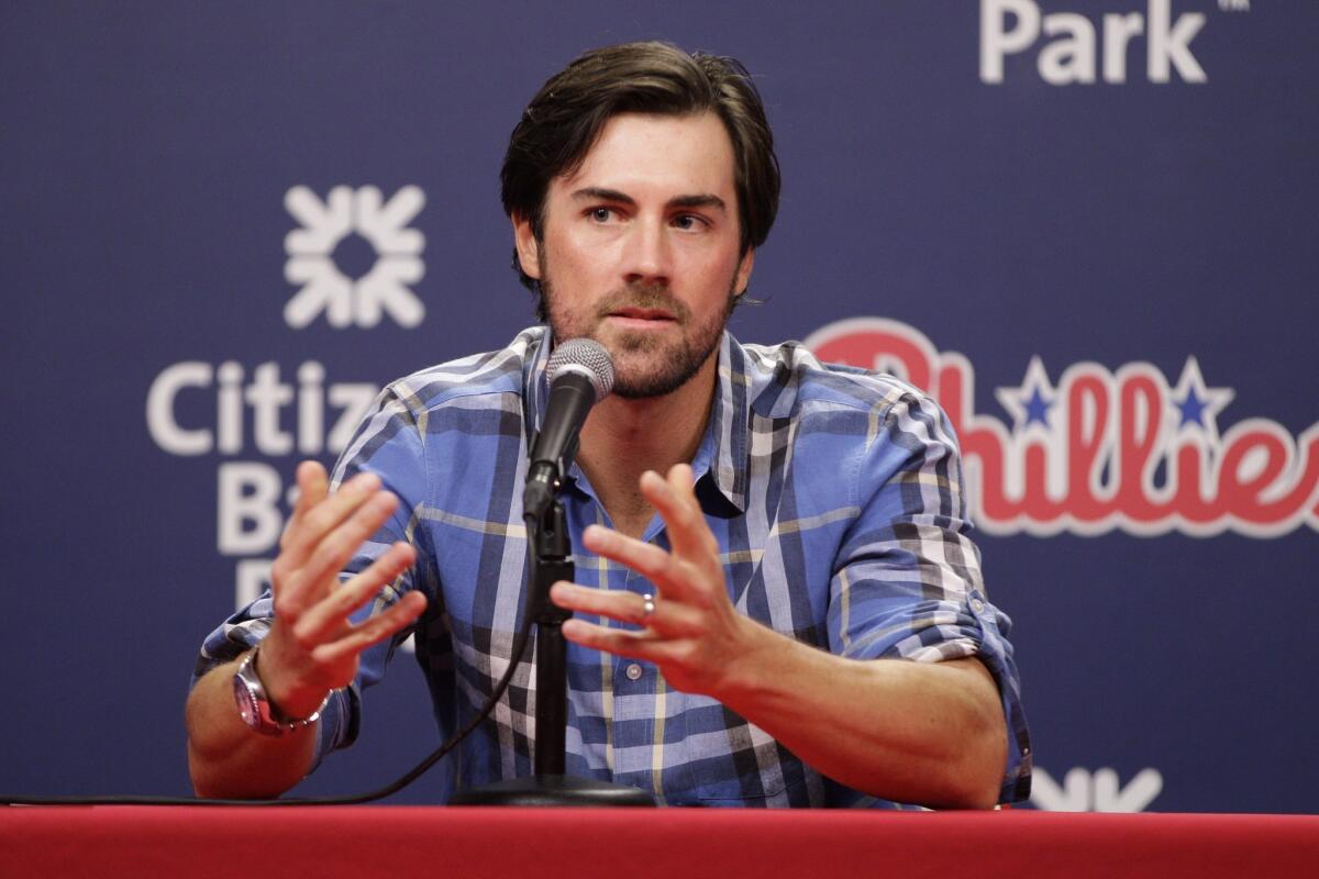 Cole Hamels talks to the Philadelphia media Friday after being traded from the Phillies to the Texas Rangers.