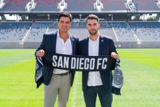 San Diego FC CEO Tom Penn, left, and San Diego FC Sporting Director Tyler Heaps