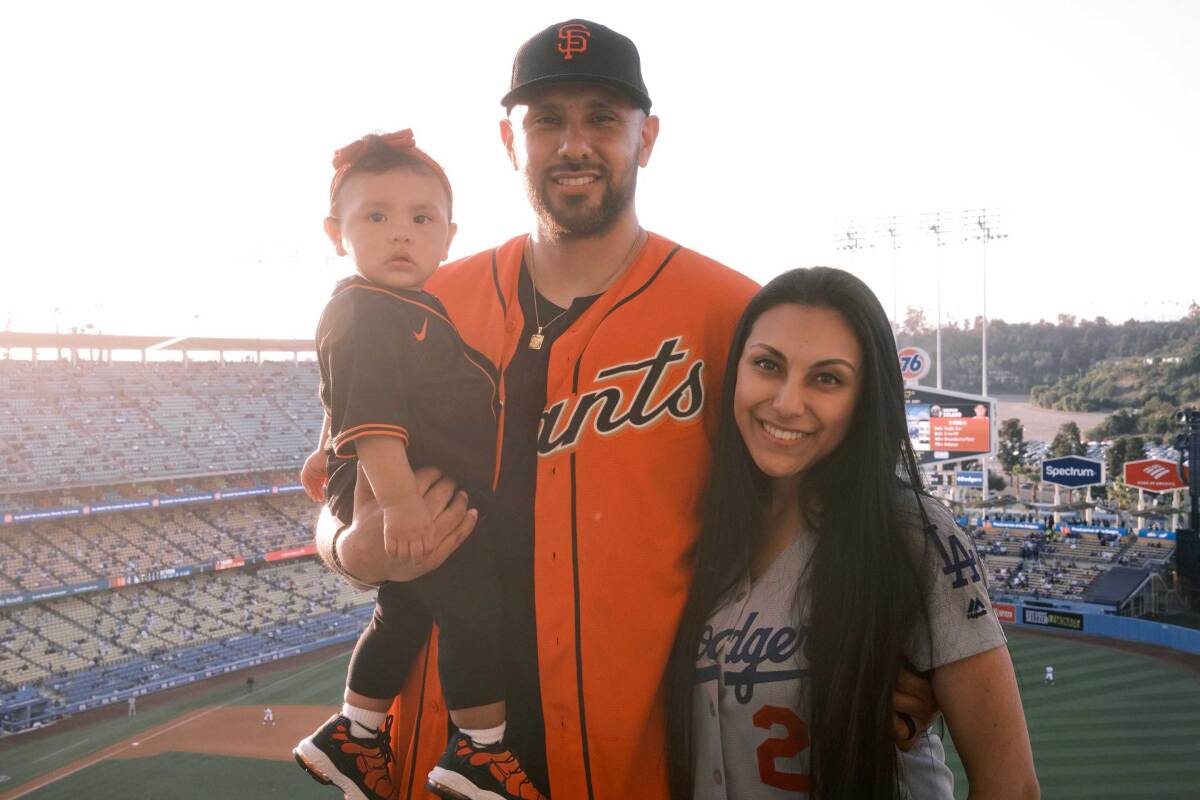 She's a Dodgers fan. He's a Giants fan. Can they survive the NLDS - Los  Angeles Times