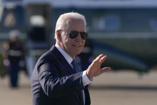President Joe Biden waves before boarding Air Force One at Heathrow Airport in London, Sunday, June 13, 2021. Biden is en route to Brussels to attend the NATO summit. (AP Photo/Patrick Semansky)