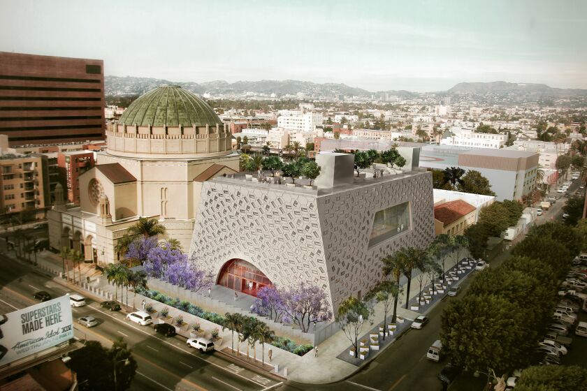 A rendering of the Audrey Irmas Pavilion besides the Wilshire Temple in Koreatown. The pavilion was designed to bring together communities, the multi-use space will serve L.A.s oldest Jewish congregation and house a recently announced Annenberg Foundation initiative focusing on purposeful aging, which will be used by the greater public. Architect Shohei Shigematsu, OMA partner and head of the New York office, designed the pavilion, which is schedule to open in late 2020. The design team includes Los Angeles practices Gruen Associates, Studio-MLA, and Arup. With a dramatically sloped façade punctuated with windows, it looks at once looks monolithic and porous. One challenge was balancing the need for security with the need for openness.