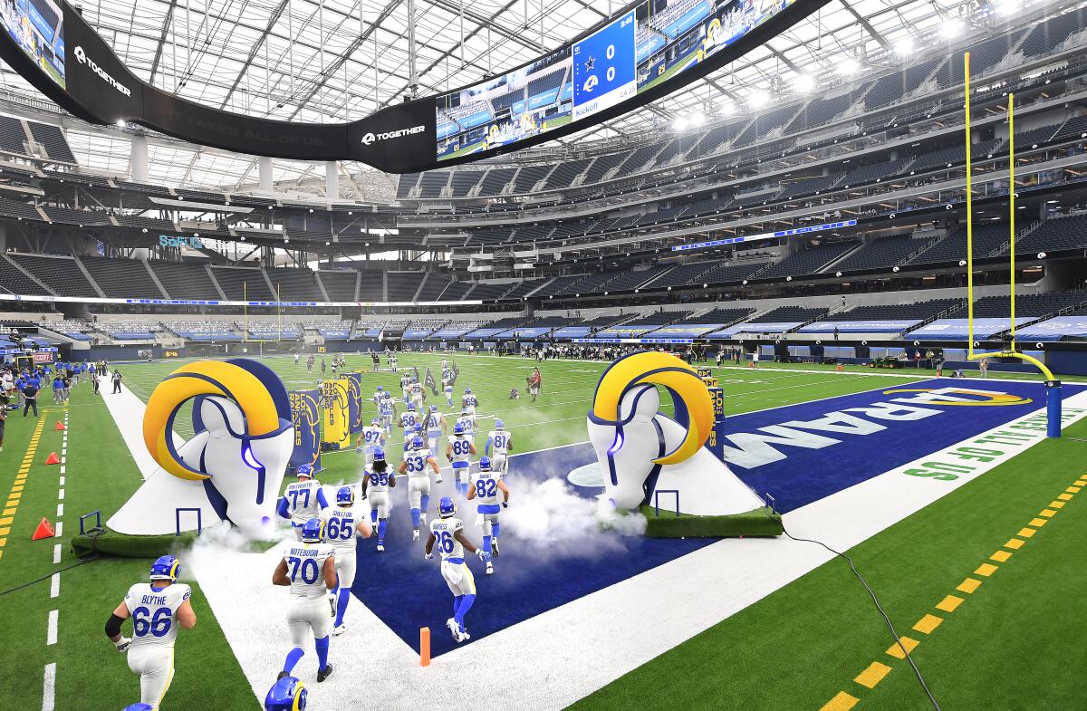 INGLEWOOD, CALIFORNIA SEPTEMBER 13, 2020-Rams players take the field before a game against the Cowboys.