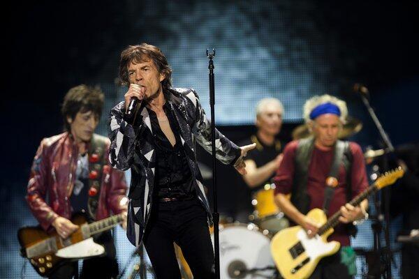 Ronnie Wood, left, Mick Jagger, Charlie Watts and Keith Richards perform at Staples Center in Los Angeles on Friday as part of the Rolling Stones' 50 and Counting Tour.