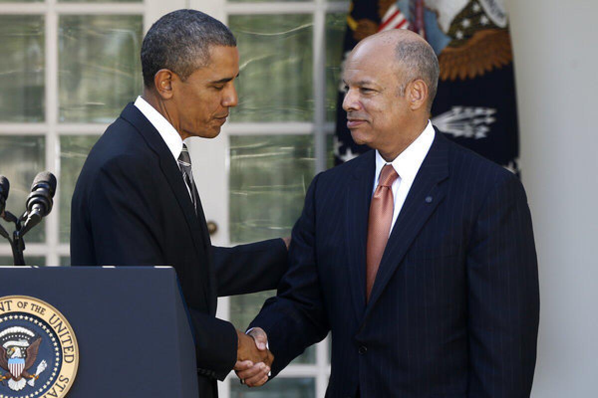President Obama shakes hands with Jeh Johnson, his nominee to be the next Homeland Security secretary.