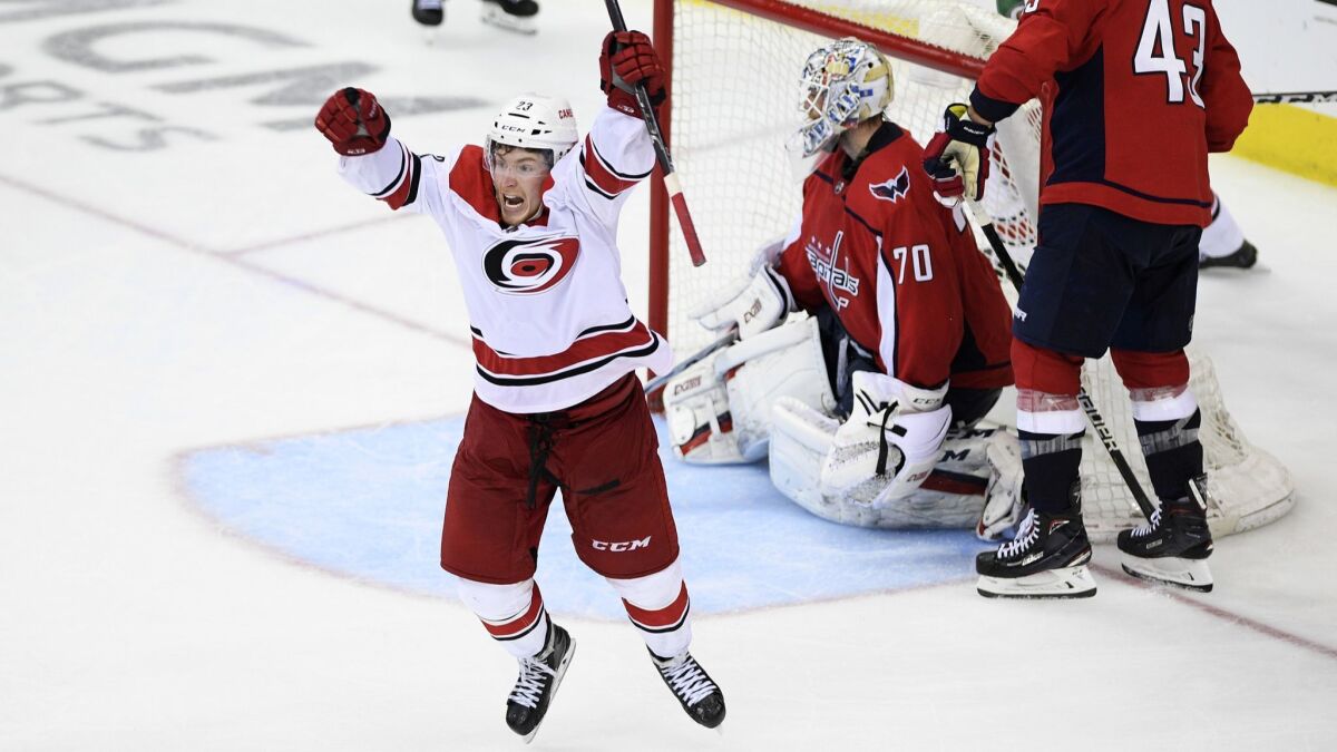 Carolina Hurricanes left wing Brock McGinn celebrates his winning goal during double overtime against the Washington Capitals on April 24.