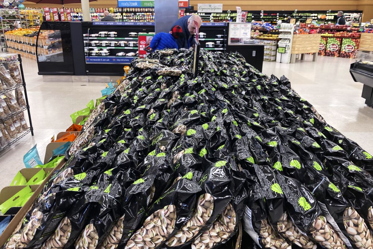 FILE - Bags of Pistachios are displayed at a grocery store in Mount Prospect, Ill., on, April 1, 2022.