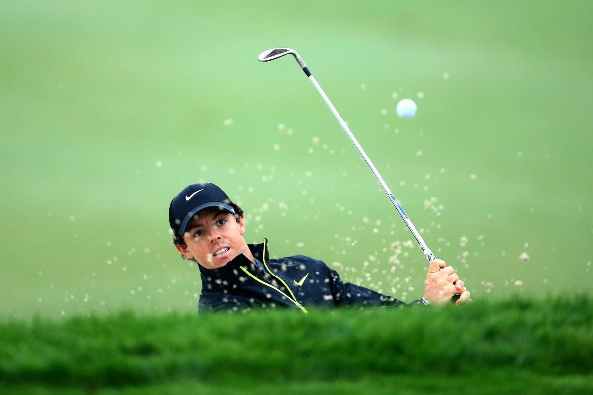 Rory McIlroy hits a shot out of a greenside bunker at No. 4 on Friday during the second round of the Honda Classic.