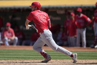 Los Angeles Angels' Nolan Schanuel watches his RBI single against the Oakland Athletics.