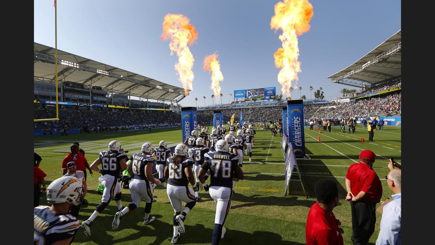 The Los Angeles Chargers take the field for the first game.