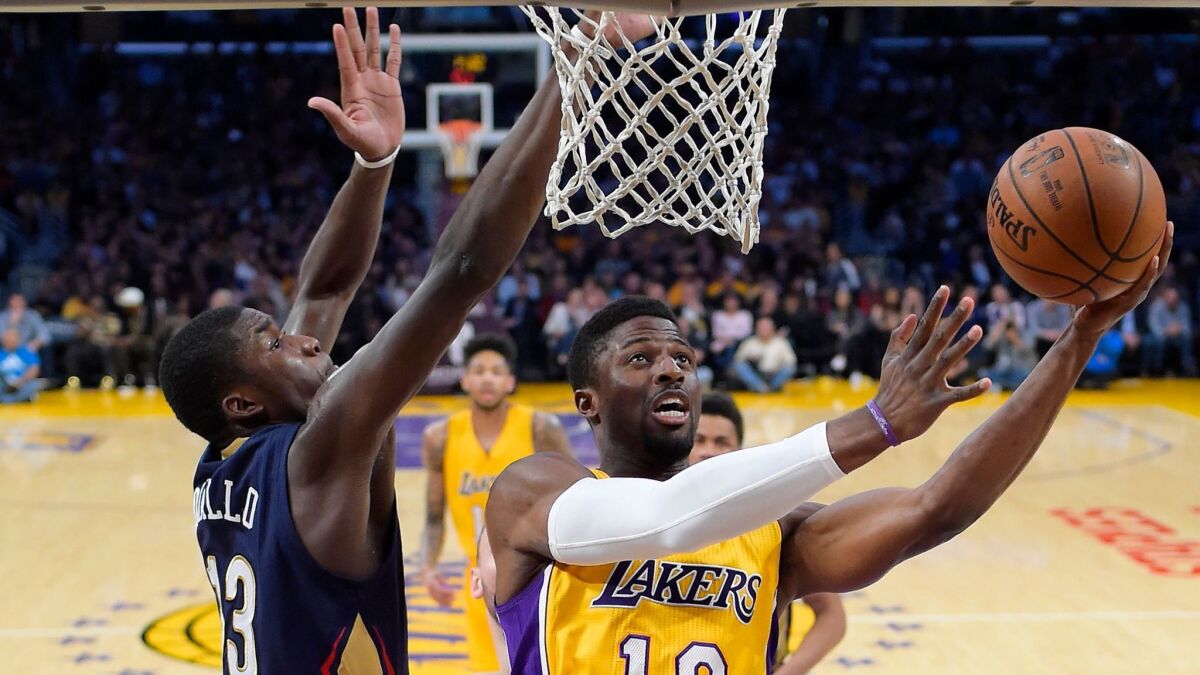 David Nwaba shoots against New Orleans' Cheick Diallo on April 11.
