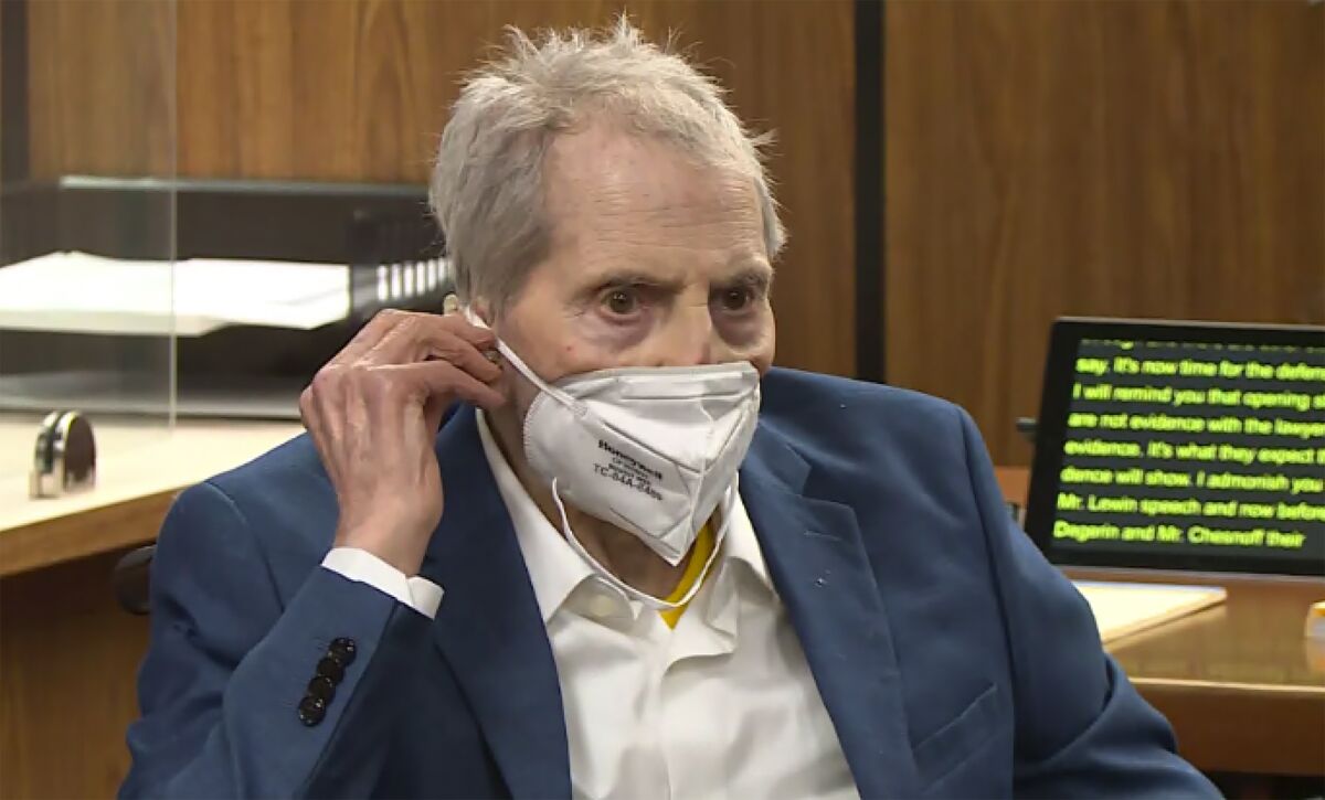 FILE - In this still image taken Wednesday, May 19, 2021, from the Law & Crime Network court video, real estate heir Robert Durst watches as his defense attorney Dick DeGuerin presents a new round of opening statements in the murder case against Durst in Los Angeles County Superior Court in Inglewood, Calif. Durst is expected to take the stand at his Los Angeles County murder trial on Thursday, Aug. 5. (Law & Crime Network via AP, Pool, File)