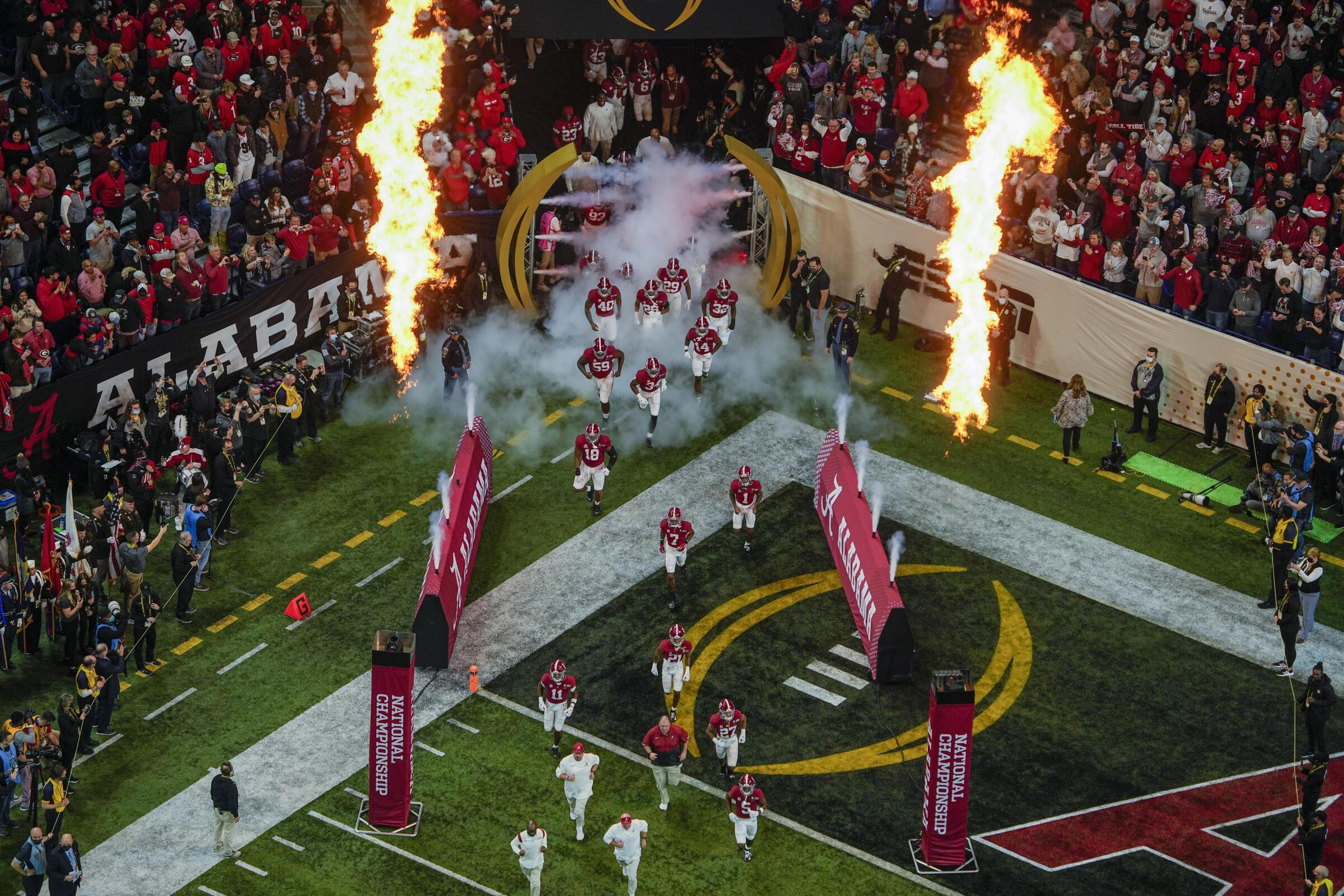 Alabama players are introduced before their College Football Playoff championship loss to Georgia in January.