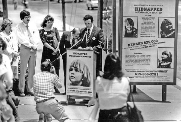In 1986, then-Rep. Dan Lungren addresses a group in Huntington Beach at the unveiling of Laura Bradbury posters to be circulated at bus stops.