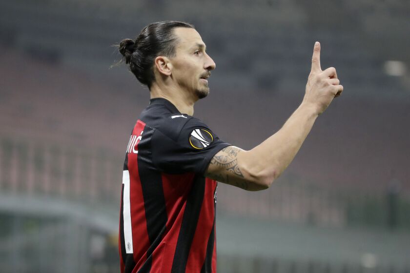 AC Milan's Zlatan Ibrahimovic gestures during the Europa League Group H soccer match between AC Milan and Lille.