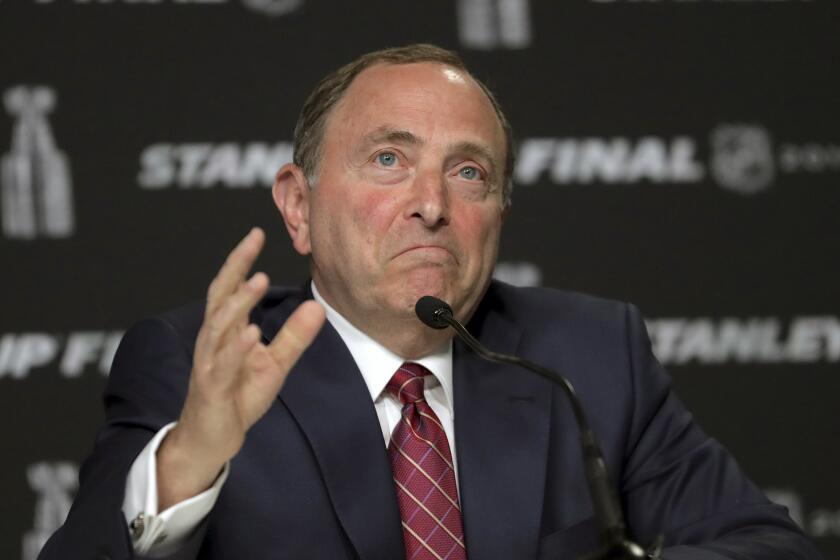 FILE - In this May 27, 2019, file photo, NHL Commissioner Gary Bettman speaks to the media before Game 1.
