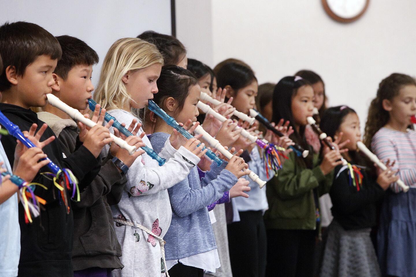 La Canada Elementary third grade and first year recorder players play a song at the annual Spotlight on Students presentations on Monday, May 6, 2019. The area school PTA boards were installed earlier.
