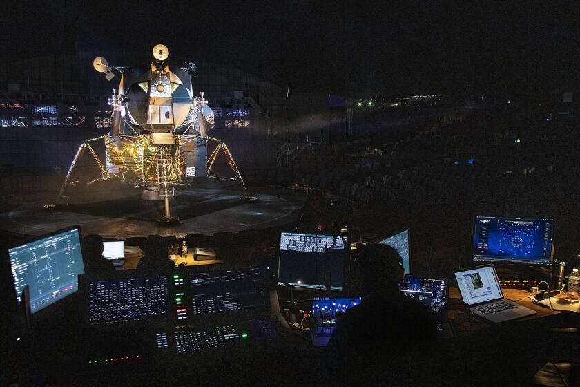 PASADENA, CA - JULY 3, 2019: A replica of the Apollo 11 lunar module sits on stage during rehearsal for Apollo 11: The Immersion Live Show inside the Lunar Dome in the parking lot of the Rose Bowl on July 3, 2019 in Pasadena, California. The Lunar Dome is a custom-built theater with seating for 1,600 people.The 90 minute show takes audiences on an epic journey to the Moon and back.(Gina Ferazzi/Los AngelesTimes)
