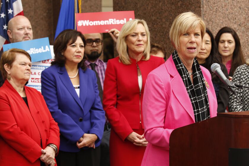 LOS ANGELES, CA - DECEMBER 13, 2016 - Los Angeles County Board of Supervisor Janice Hahn, right, talks during a press conference as Supervisors Sheila Kuehl, Hilda L. Solis and Kathryn Barger, left to right, listen about how the Los Angeles County Board of Supervisors, now comprised of a historic female majority, will address the disproportionate disadvantages and burdens currently facing women and girls throughout the region with a motion, co-authored by Supervisors Kuehl and Hilda Solis, to create a five-year county initiative on women and girls. (Al Seib / Los Angeles Times)