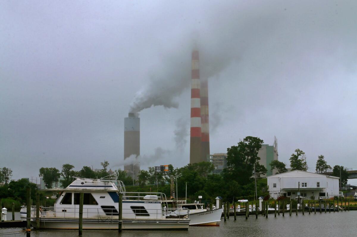 Eventually to become a scene of the past? Emissions spew from a coal-fired power plant in Maryland.