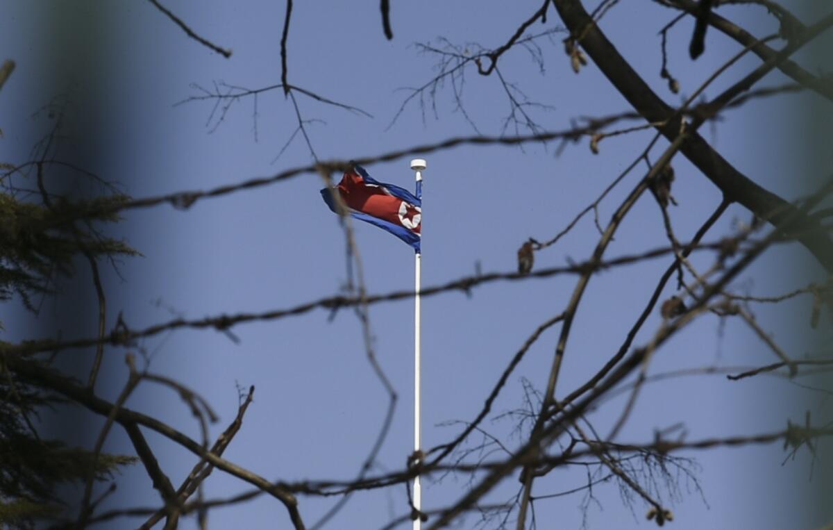 The North Korean flag flies over the country's embassy in Beijing.