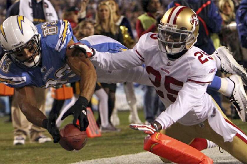 San Francisco 49ers cornerback Tarell Brown is unable to stop Chargers wide receiver Vincent Jackson from finding pay dirt on Dec. 16, 2010.