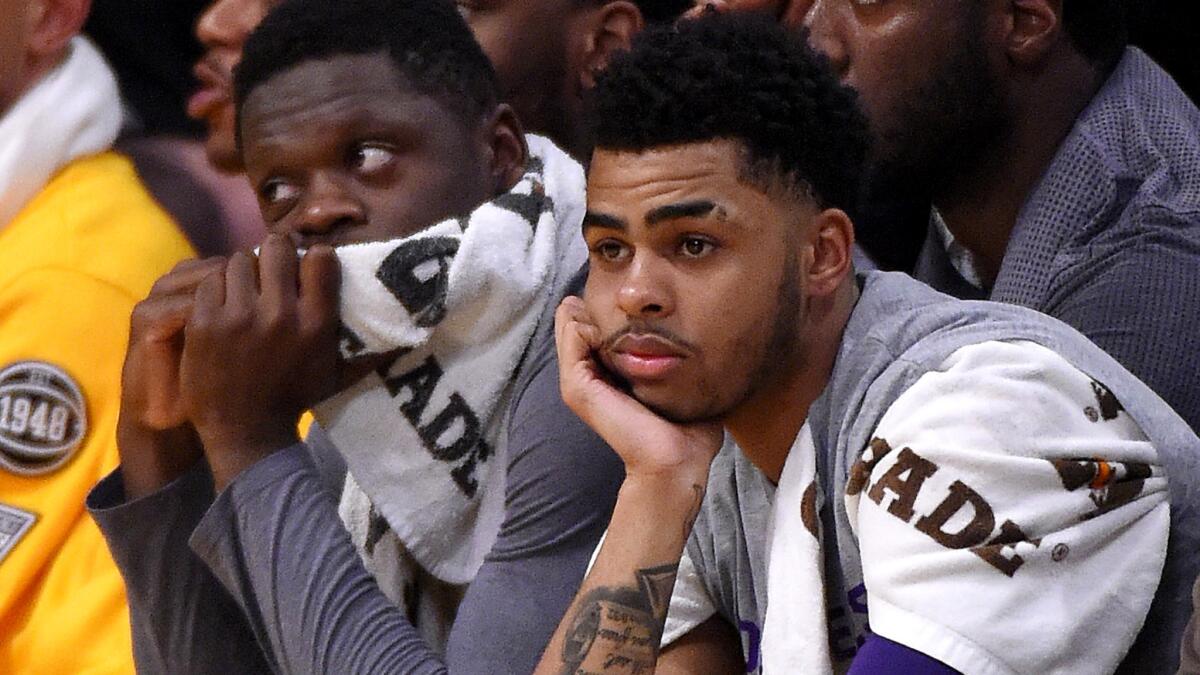 Although the results have been lackluster, the numbers put up by rookie guard D'Angelo Russell, right, and second-year forward Julius Randle have been noteworthy.