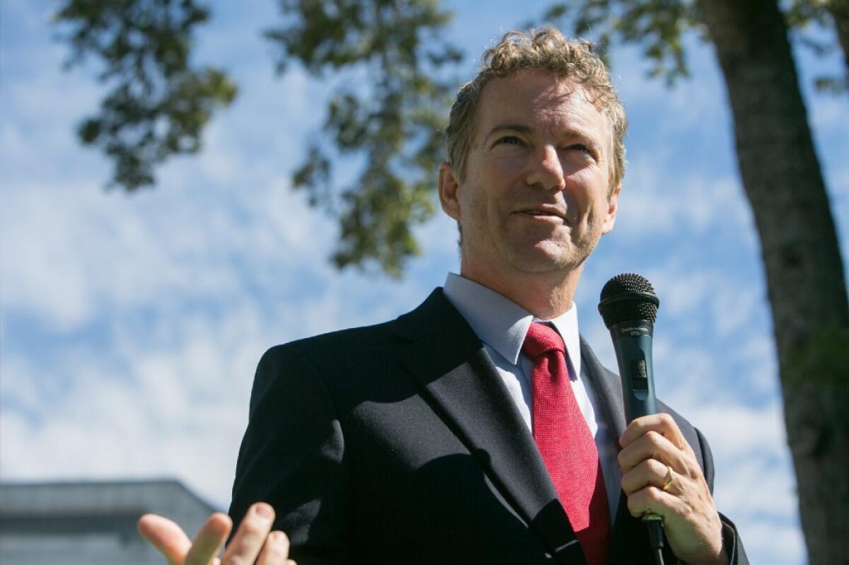 Sen. Rand Paul (R-Ky.) speaks to an audience of supporters of Georgia Senate candidate David Perdue on Friday.