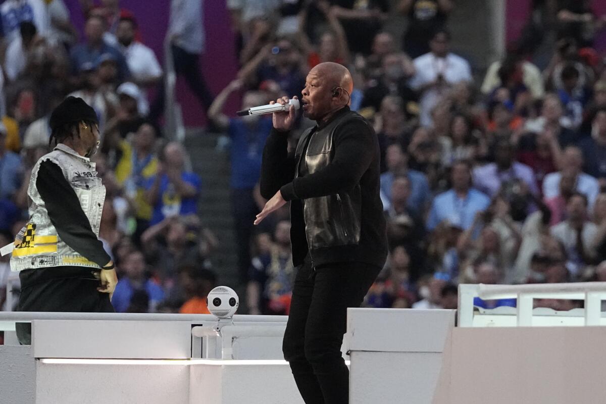 FILE - Dr. Dre performs during halftime of the NFL Super Bowl 56 football game between the Los Angeles Rams and the Cincinnati Bengals, Sunday, Feb. 13, 2022, in Inglewood, Calif. Former Superintendent of Los Angeles Unified School District Austin Beutner is behind a ballot measure that would create a dedicated funding stream that California's legislative analyst estimates would pump as much as $1 billion a year into arts and music education. The initiative has no organized opposition, a rarity, and is backed by celebrities from Barbra Streisand to Dr. Dre. (AP Photo/Tony Gutierrez, File)