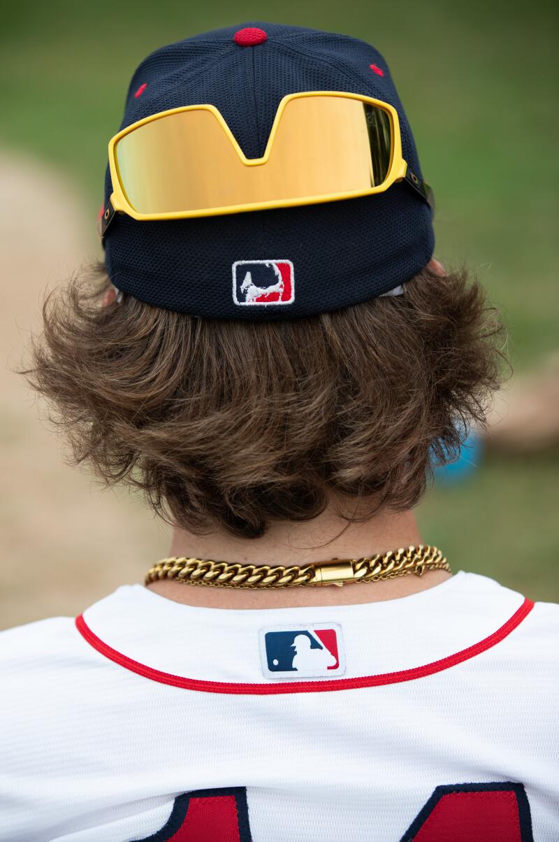 Nolan Sliver's glasses reflect while he watches a game between the Y-D Red Sox and Orleans.