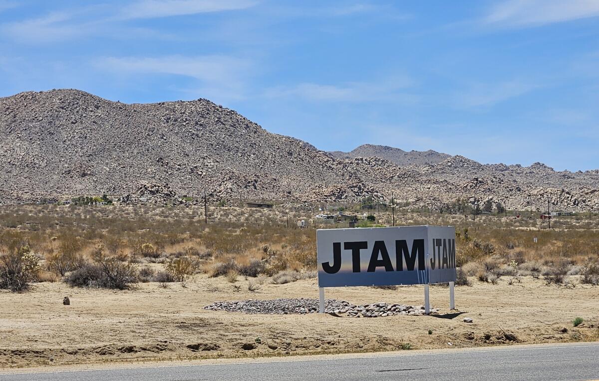 A sign announcing a proposed Joshua Tree Art Museum has gone up on Twentynine Palms Highway.