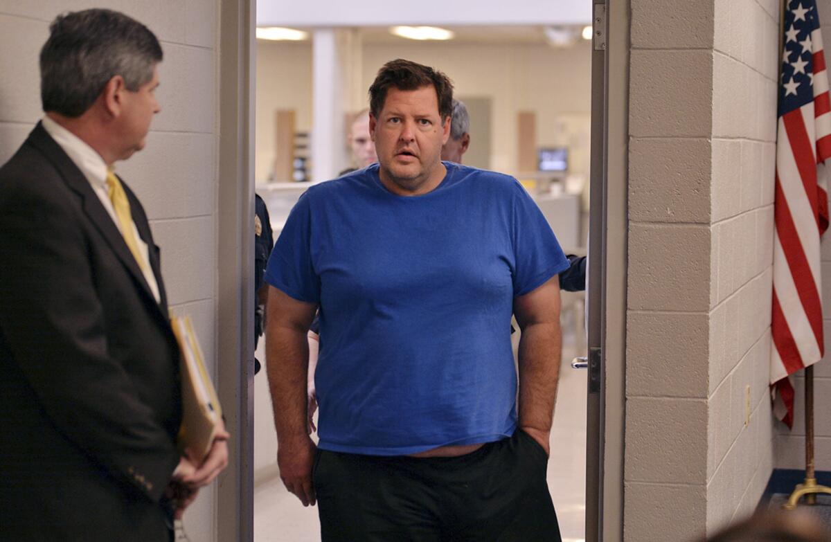 Todd Kohlhepp is escorted into a courtroom in Spartanburg, S.C., Friday for a bond hearing.