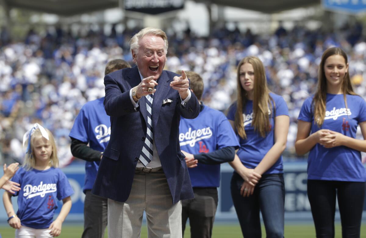 Vin Scully has a cold and will miss his second game Tuesday night.