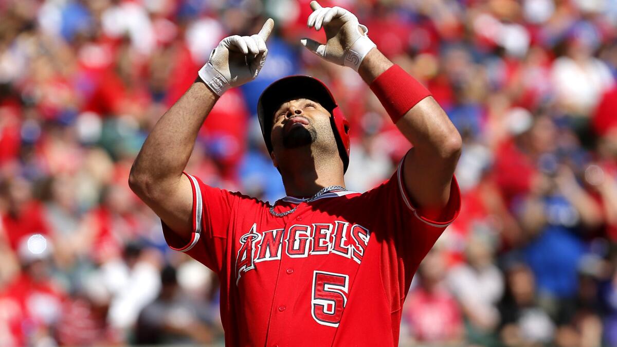 Albert Pujols provided the Angels with their only runs against the Rangers on Sunday with a two-run homer in the first inning.