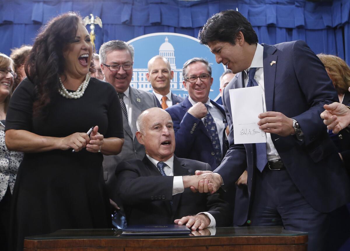 Gov. Jerry Brown after signing SB100, which sets a goal of phasing out all fossil fuels from the state's electricity sector by 2045.