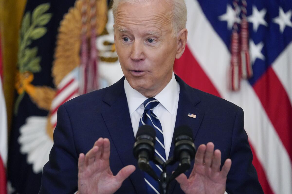 President Biden speaks during a news conference at the White House.