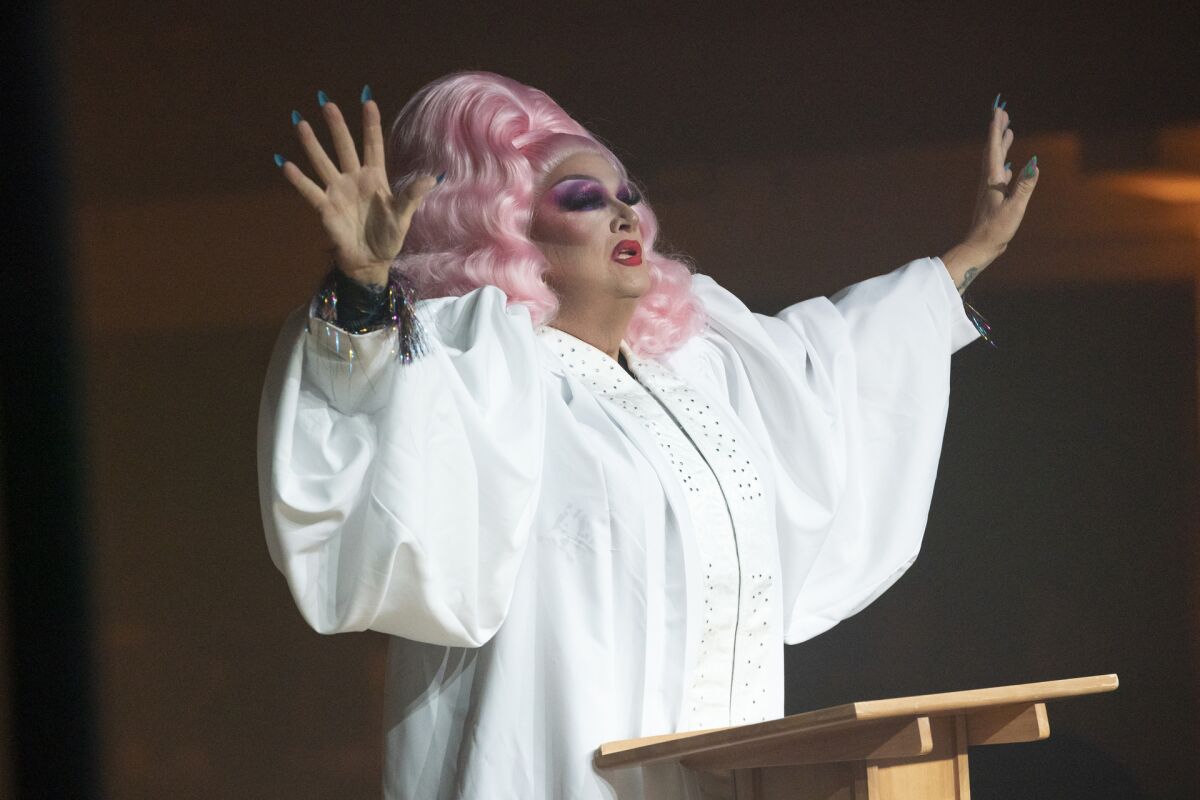 This image from HBO shows Pastor Craig Duke, of Newburgh, Ind., appearing in drag in the HBO series "We're Here." 